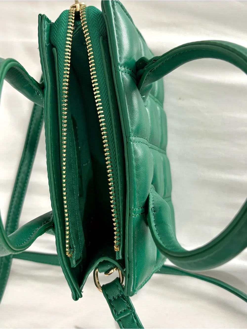 Green quilted mini handbag with removable adjustable crossbody strap